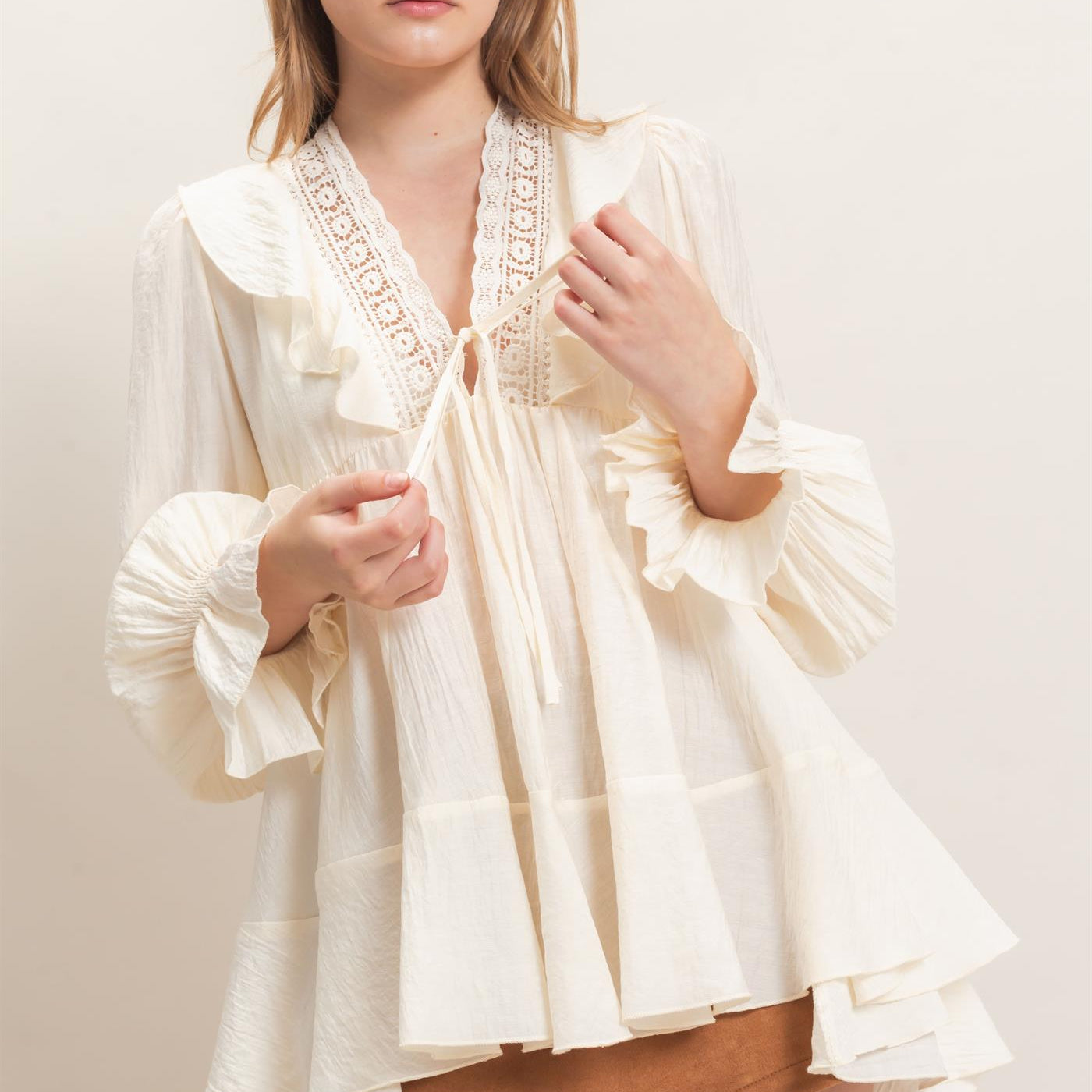 Wholesale Ruffle Lace Tie Neck Blouse Tunics HF26E642 CREAM HYFVE