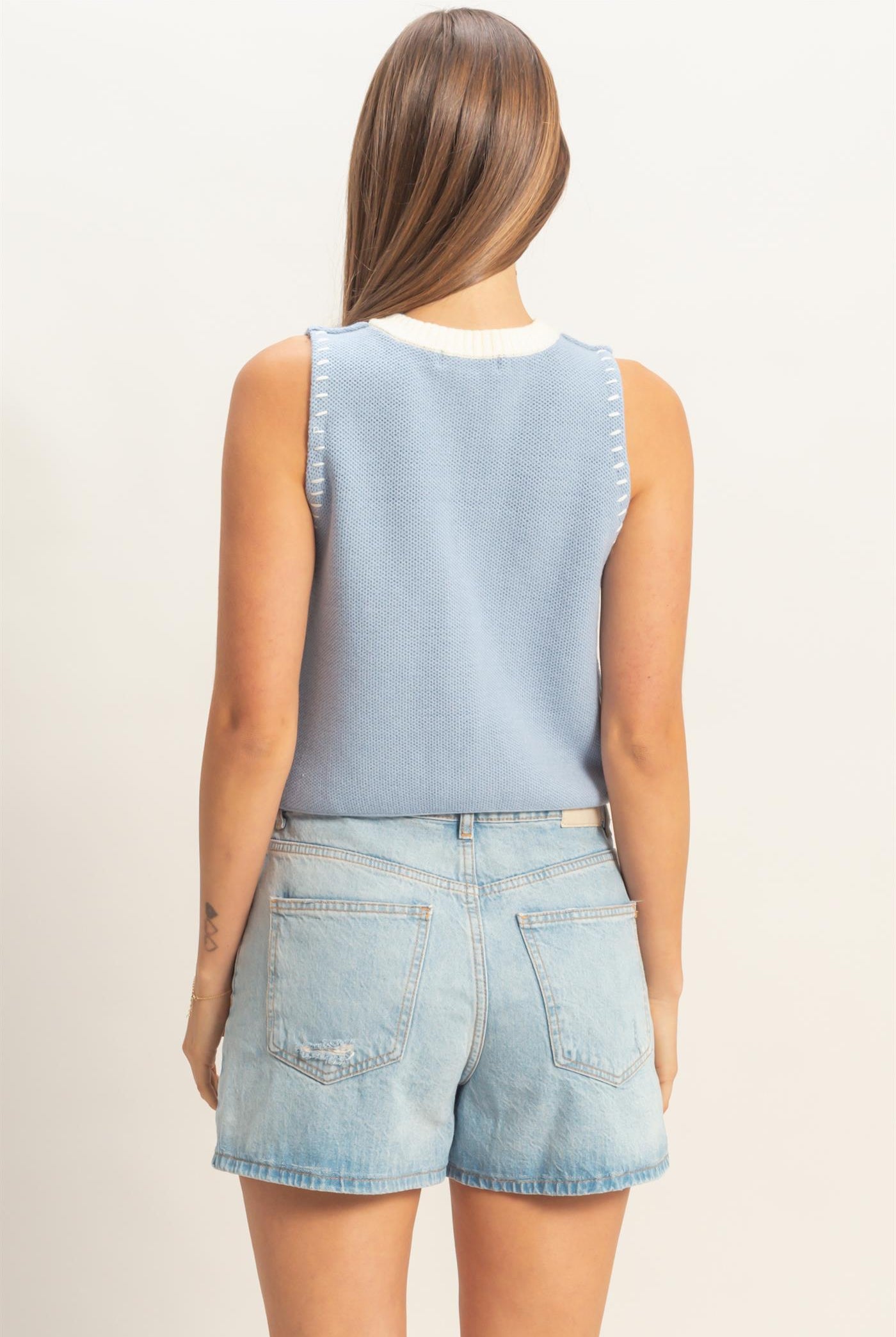 Wholesale Sleeveless Button-Up Cardigan Vest Sweaters HF26A357 L.BLUE HYFVE