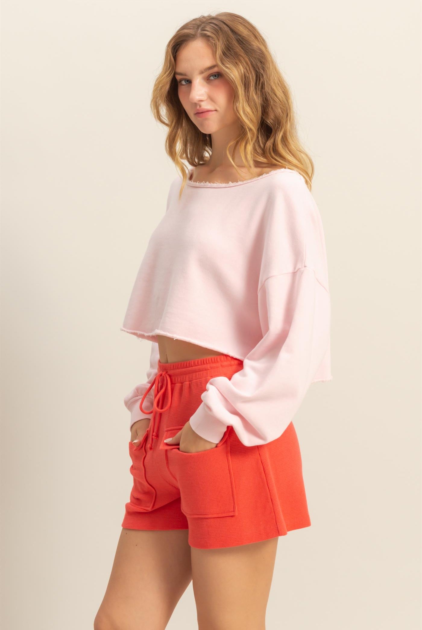Wholesale Frayed Detail Long Sleeve Crop Top Sweatshirts DZ25A776 SOFT PINK DOUBLE ZERO